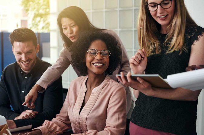 racially diverse group in a business setting